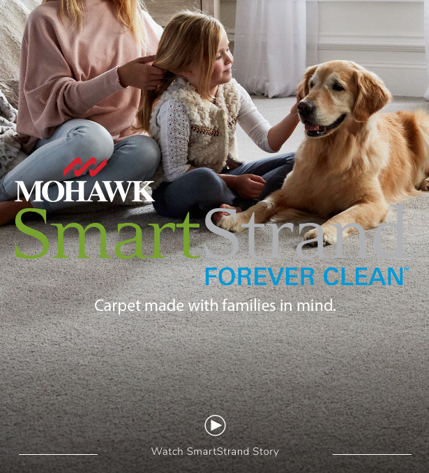 Mother and daughter sitting on SmartStrand carpet flooring with a golden retriever dog
